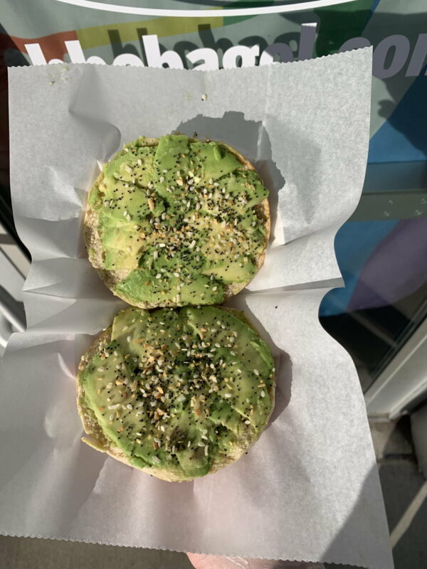 A pair of avocado toast topped with the everyseed mix